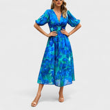 Clara | Rochie midi elegantă cu flori