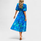 Clara | Rochie midi elegantă cu flori