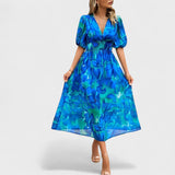 Clara | Rochie midi elegantă cu flori