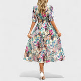 Clara | Rochie midi elegantă cu flori