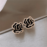 Anneli | Eleganți motiv de lotus negru în aur – bijuterii pentru evenimente